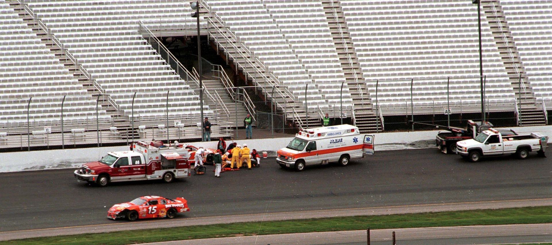 E.M.T. attends to Adam Petty after his crash at the New Hampshire Speedway. Source: Getty